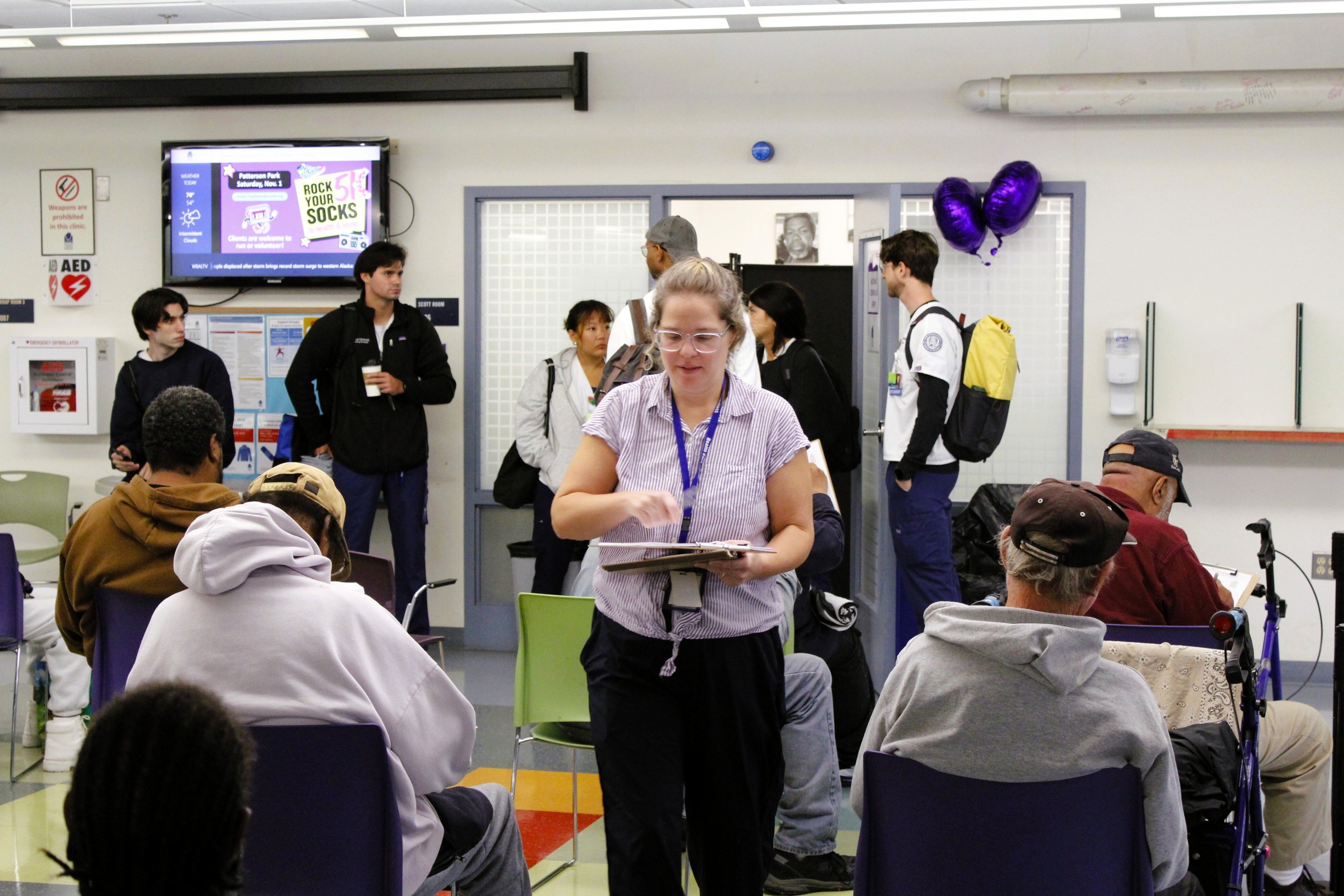 Clients wait in the lobby for their flu shots.
