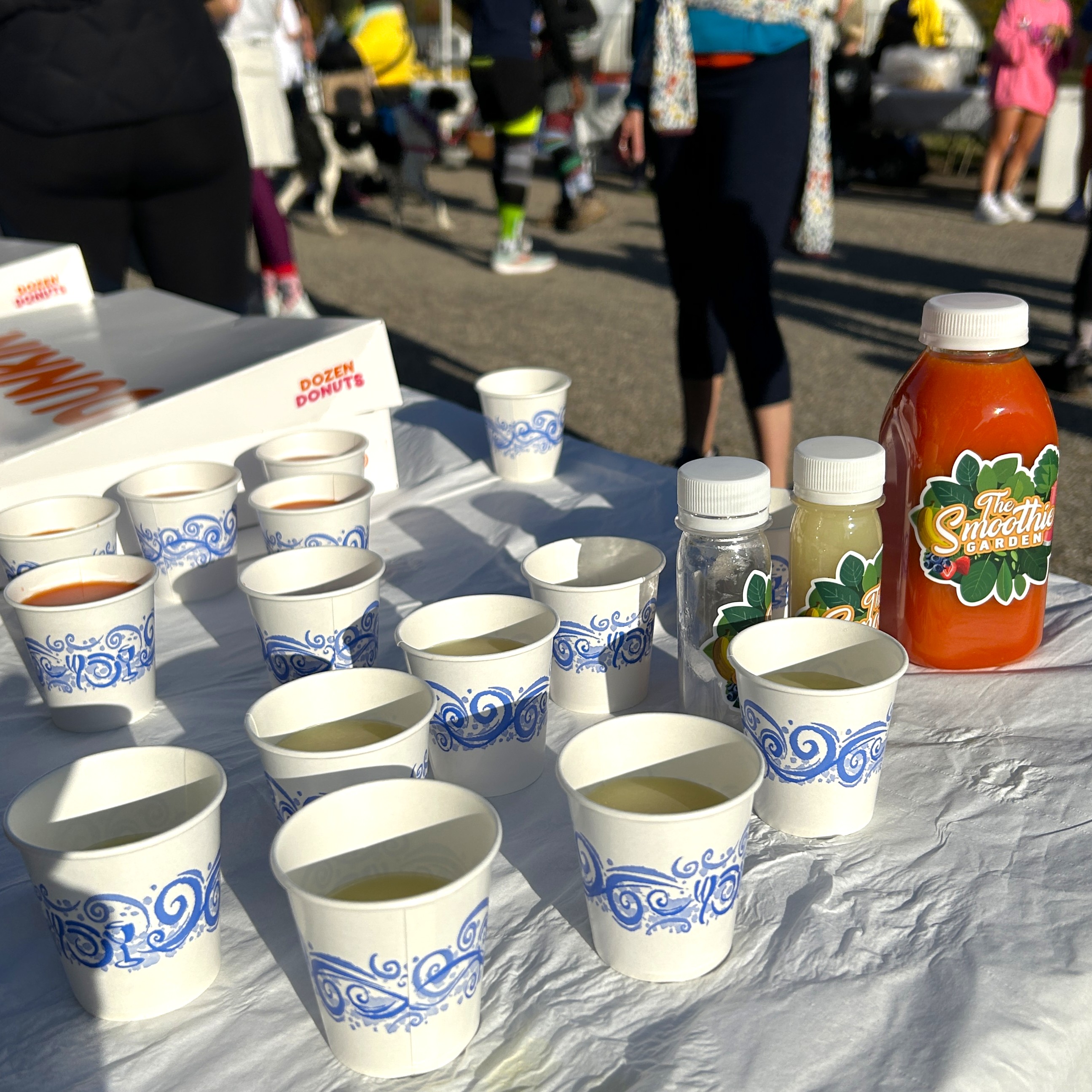 Cups of juice on a table