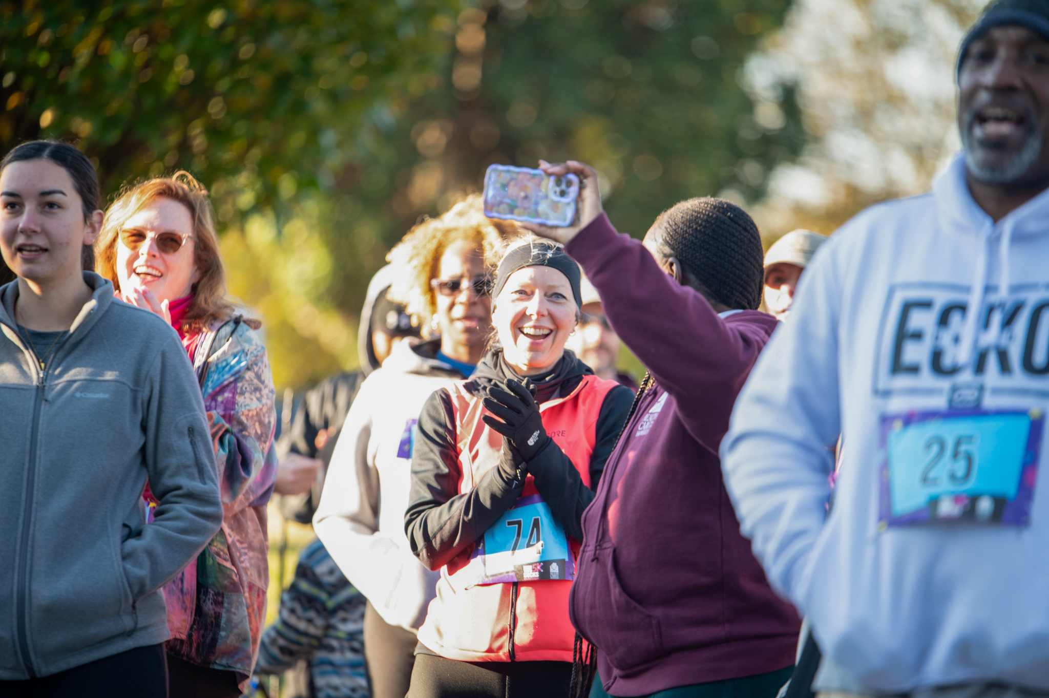 5K participants take a selfie with a cell phone