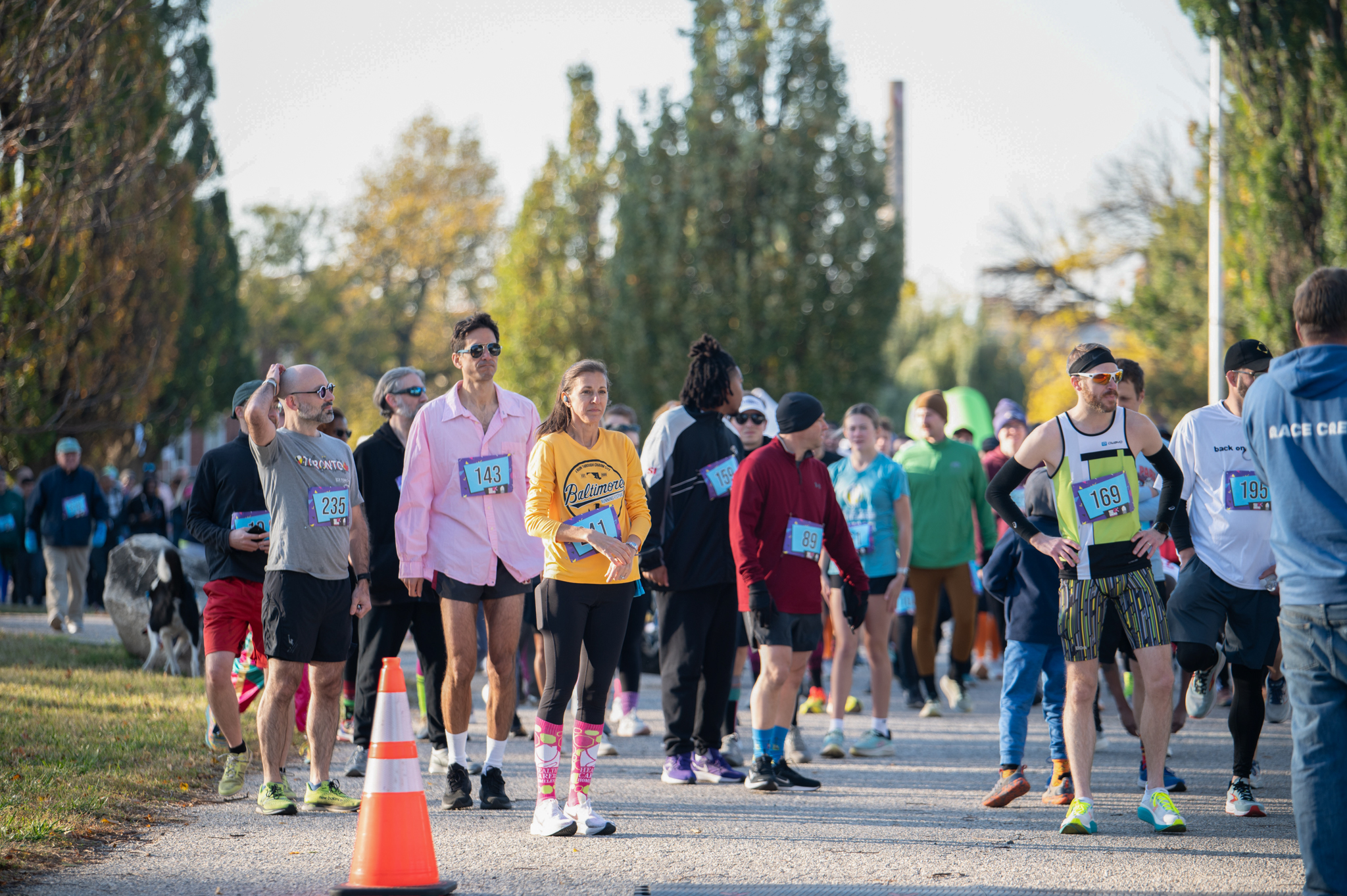 A group of 5K participants gather at the starting line