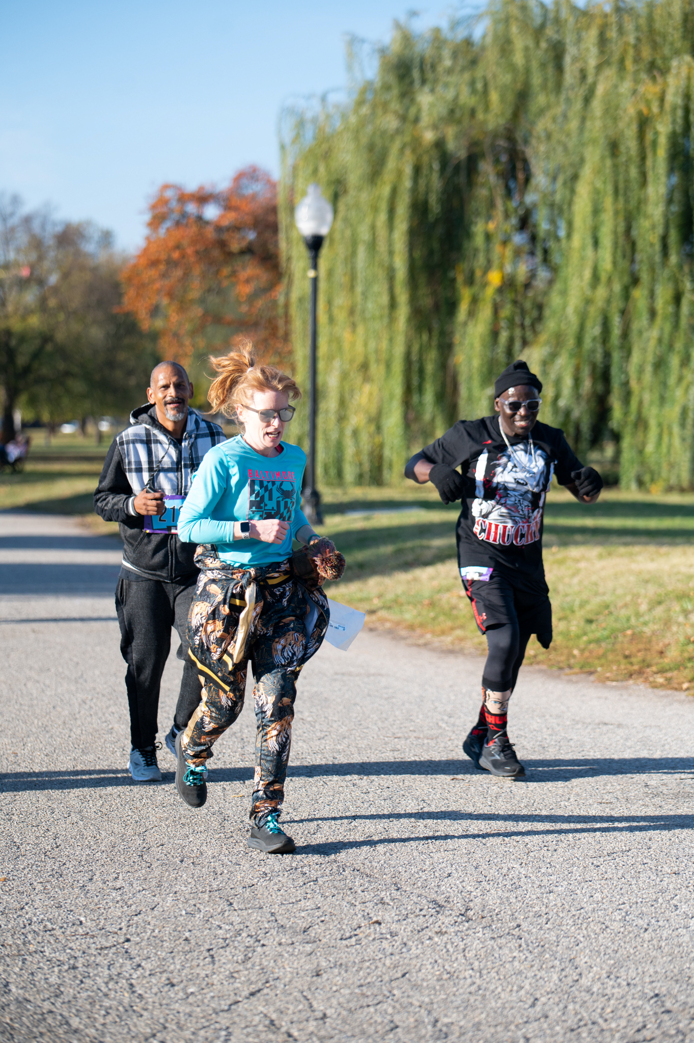 Three 5K joggers follow the course