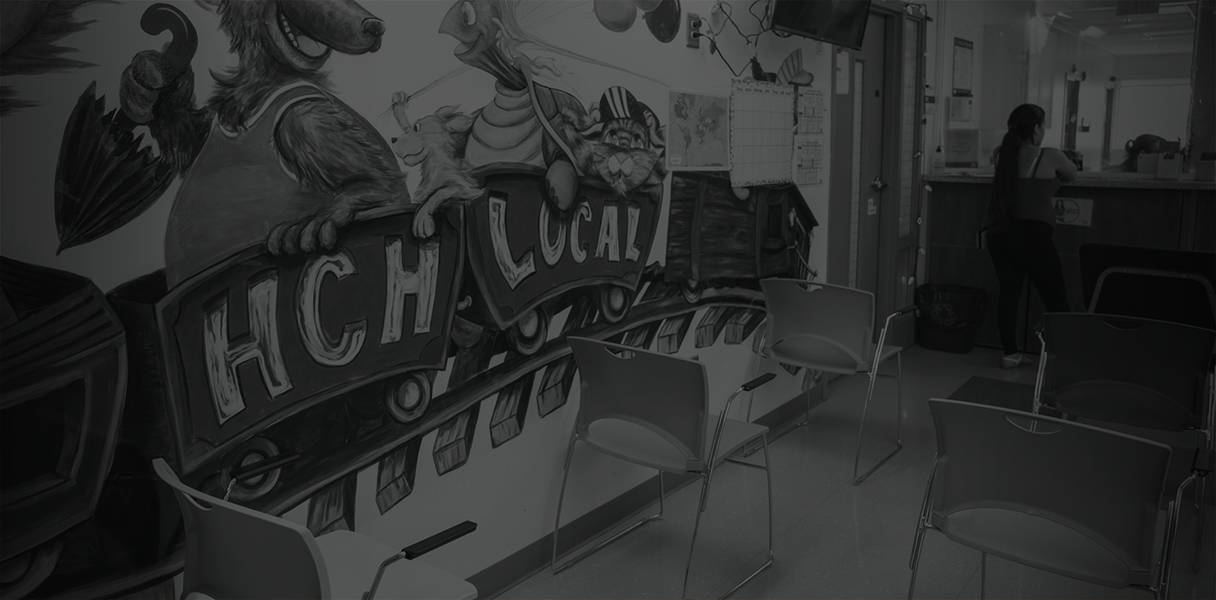 Black and white photo of the pediatrics clinic mural.