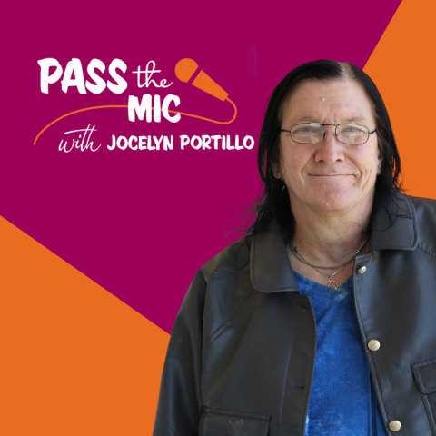A light skinned person with dark hair in front of the purple and orange Pass the Mic logo.