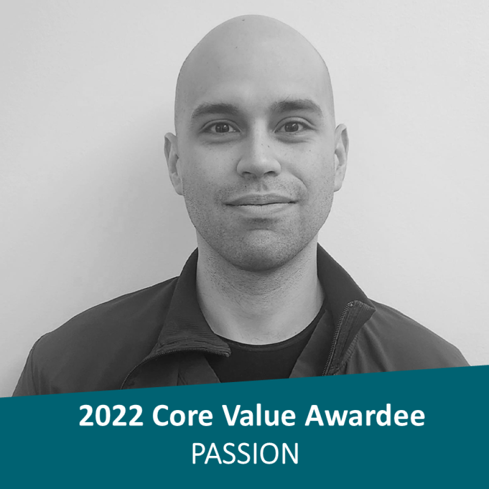 Light-skinned man with no hair. Banner notes 2022 Core Value Awardee.